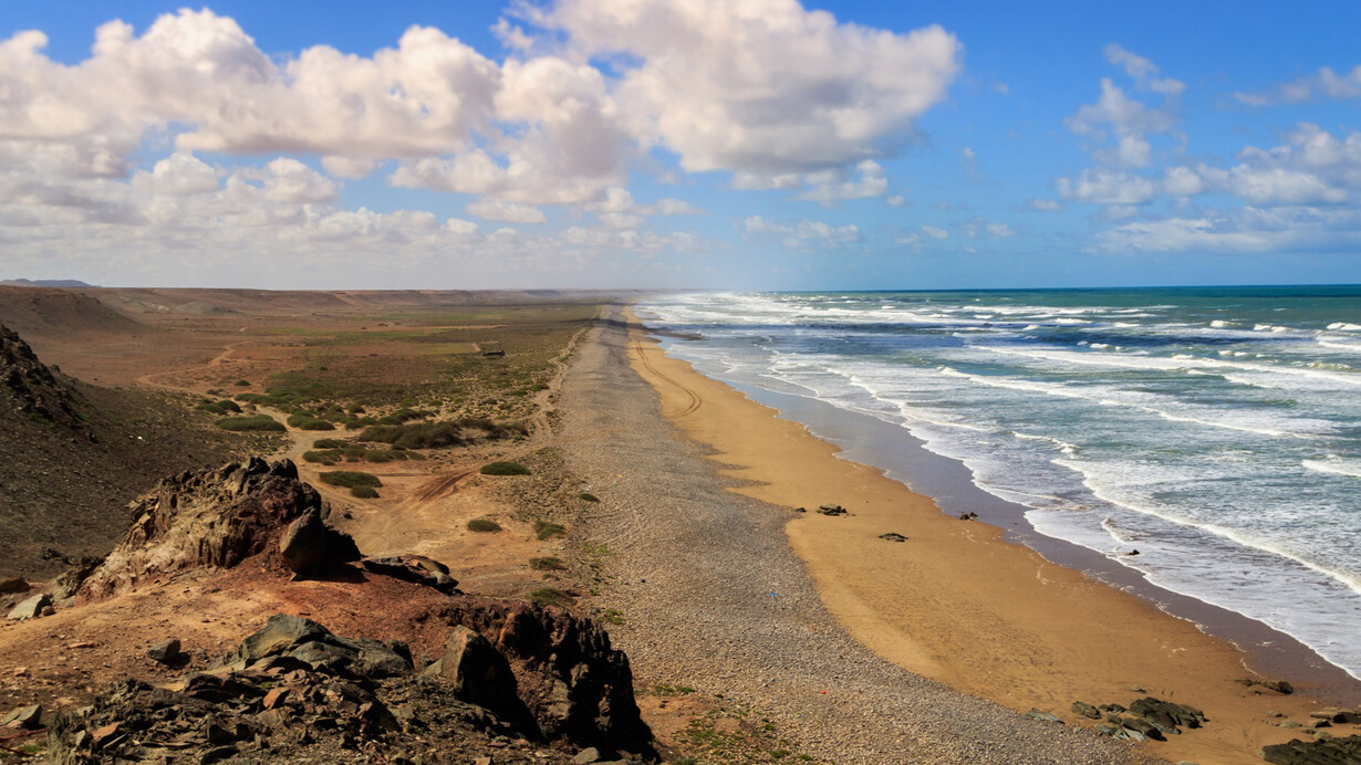Seaside resorts programmed in the Sahara, include Guelmim Plage Blanche