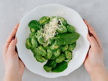 A vibrant platter of freshly harvested green vegetables, bursting with color and freshness