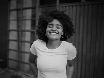 A woman who chooses as a priority happiness