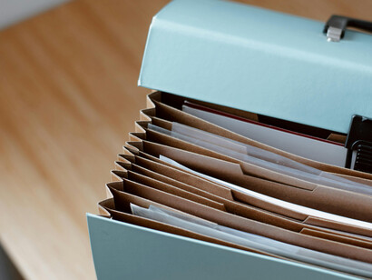 Important, physical documents stored in a portable case
