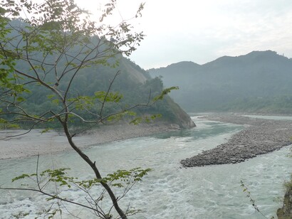 The gurgling Siyang river meanders past the Abor Country Resort