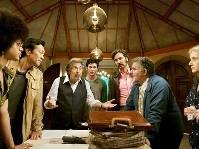 Al Pacino and his Hunters cast huddled around in a pivotal scene