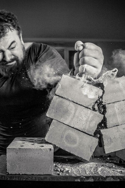 Bricks crumble after powerful hit