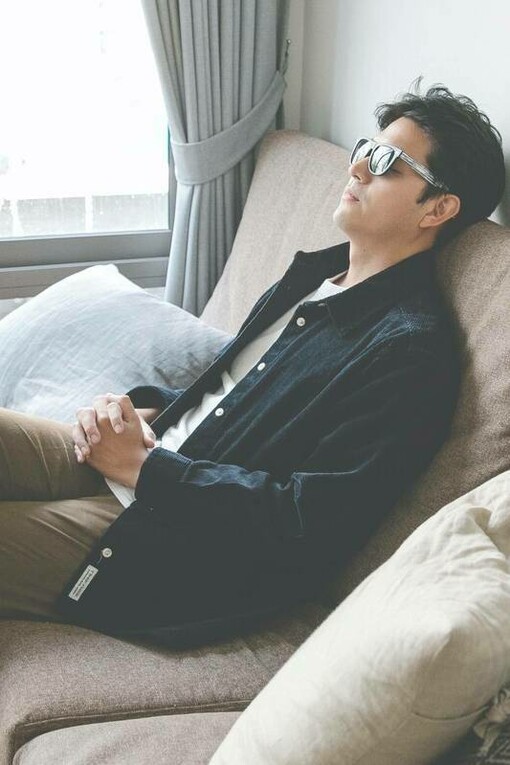 Man relaxing with sunglasses on