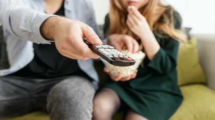 A couple watching a movie: travelling through cinema