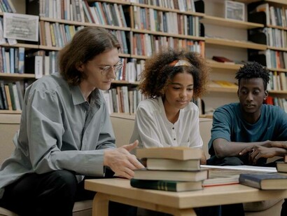 Students from the same higher education class are working together