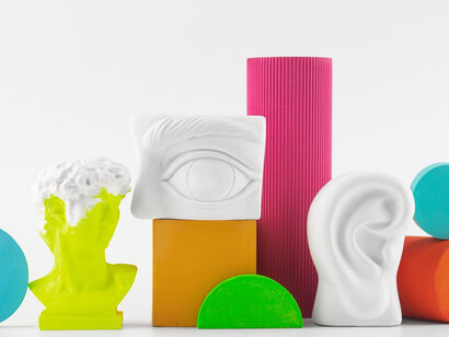 A still life of vibrant decorative objects captures the essence of colorful visualizations, sensory integration, and the brain's intricate neural connections