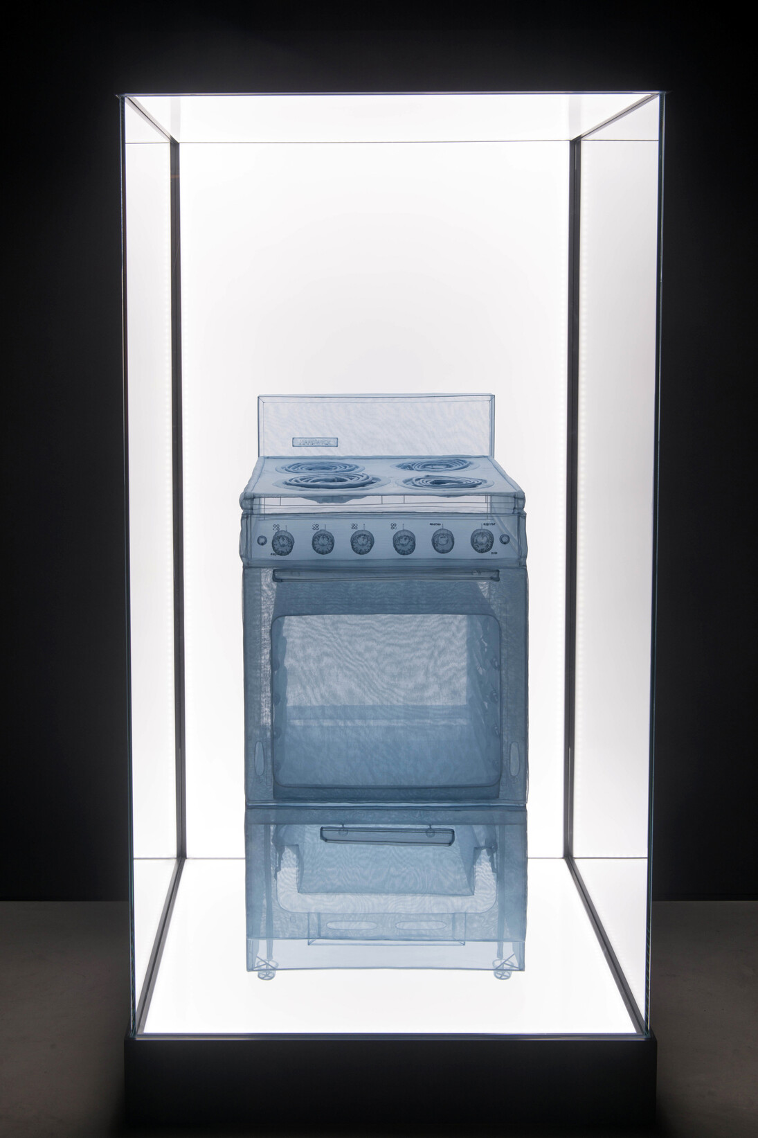 Do Ho Suh, Specimen Series: Stove, Apartment A, 348 West 22nd Street, New York, NY 10011, USA, 187.1 x 92 x 88.4 cm, polyster fabric, stainless steel wire and display case with LED lighting, 2013