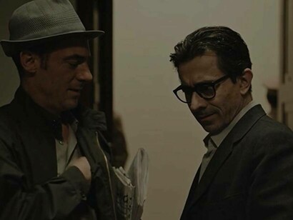 Luigi Lo Cascio (right) and Elio Germano in a scene from Lord of the Ants (2022) 
