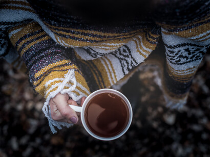 Woman with her cup of Darjeeling tea