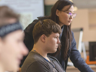 Group of students wearing electronic EEG headbands during a research session