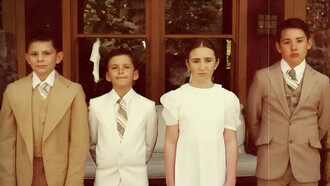 The four Roy siblings standing together with restrained expressions, representing the shared childhood wounds and fractured family bonds at the heart of Succession