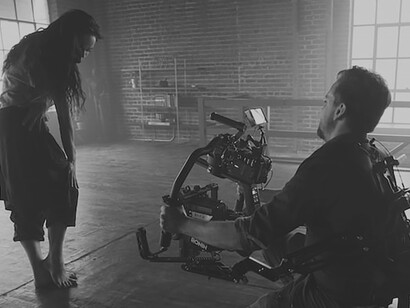 During the movie recording, the talented cameraman captured every moment with precision and skill