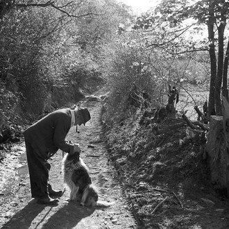 Archie Parkhouse and his Dog Sally, Photograph by James Ravilious, image courtesy of the Beaford Arhive © Beaford Arts