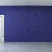 de-finition/method “elements in a spiral”, 1976 , Paint on canvas, Variable dimensions according to the actualization , Here: actualization on blue wall: 355 x 365 cm. Courtesy Perrotin. de-finition/method: a series of small canvases—though other supports can also be used from time to time—are hung in an off-center spiral. it uncoils and may reach the edge of the wall. all of its elements are painted the same color as the wall. although the number of supports is not pre-determined, the spiral that they create should be readable at a glance. the creation and installation of the spiral are the charge- taker’s responsibility, and he or she can change the work at will within the rules given above. 