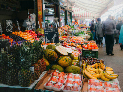 Fresh fruits and vegetables arranged on a market rack in Venice, Veneto, Italy