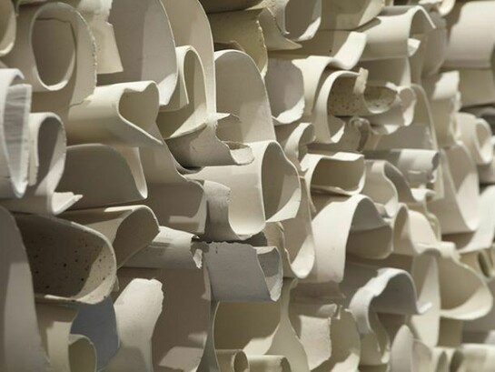 Carol Young (b. 1952). Memoria (Memory), 2013. Ceramic installation of 130 elements. Courtesy of the artist.