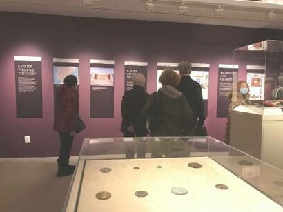 People reading up on the history of The Sefarad at the capsule exhibit, “At the Crossroads of Sefarad: In the Footsteps of the Crypto-Jews” on Opening Night at Temple Emanu-El Streicker Center in New York, March 2022 