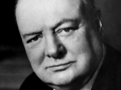 Winston Churchill, former prime minister of the UK, looks into the camera