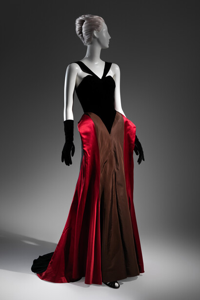 Charles James (American, born Great Britain, 1906–1978), Evening Dress, 1946, Black silk-rayon velvet, red silk satin, brown silk faille, black silk crepe © The Metropolitan Museum of Art, Brooklyn Museum Costume Collection at The Metropolitan Museum of Art, Gift of the Brooklyn Museum, 2009; Gift of Arturo and Paul Peralta-Ramos, 1954  