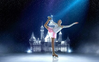 A girl figure skating gracefully on the ice