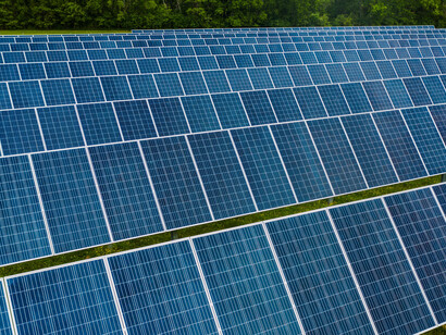 Rossville, GA, United States features a vibrant solar farm with rows of photovoltaic panels capturing energy
