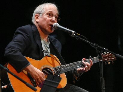 Paul Simon alla chitarra