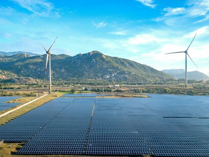 A renewable energy installation spanning wind and solar systems, reflecting the strategic diversification supporting modern regional cooperation