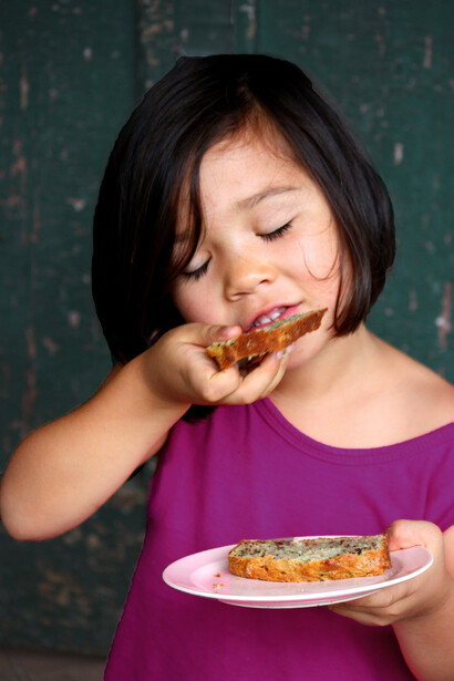 A girl enjoying her meal alone 