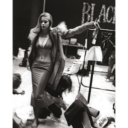 Jaime King getting dressed for the SS show The Birds, Bagleys Warehouse, 1995; Image Courtesy of Proud Galleries © Gary Wallis