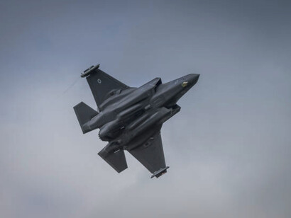 F-35 Lightning II fighter jet soaring through the sky