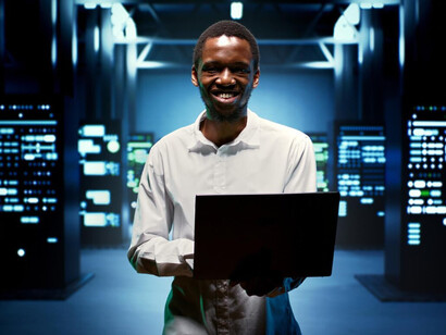 Walking between mainframes, the IT professional ensures that the networked infrastructure is optimised to support both internal enterprise systems and external cloud services