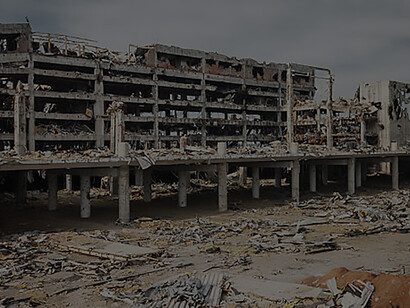 Explore the haunting aftermath of conflict with a wide-angle view capturing the ruins of Donetsk airport, symbolizing the devastation wrought by war, Ukraine