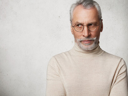 An elderly man posing, embodying the essence of aging gracefully through a healthy lifestyle