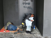 Homeless men sleeping on the streets, in downtown Los Angeles, California, the state with the largest homeless population in America. Frederic J. Brown / AFP - Getty Images
