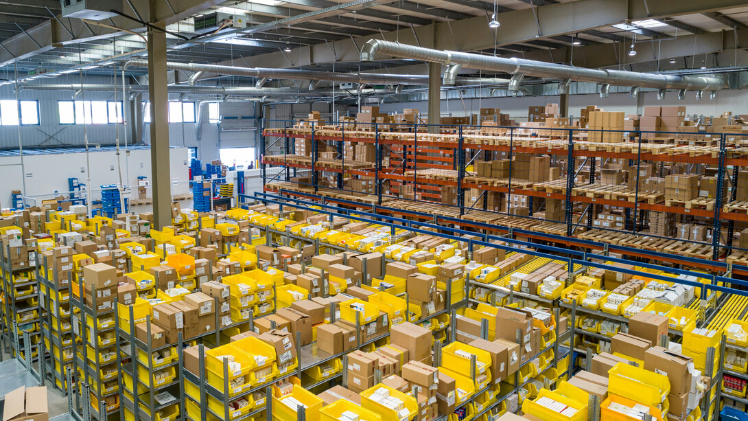 Thousands of boxes inside a warehouse, where the employees organize and manage a magnificent amount of products