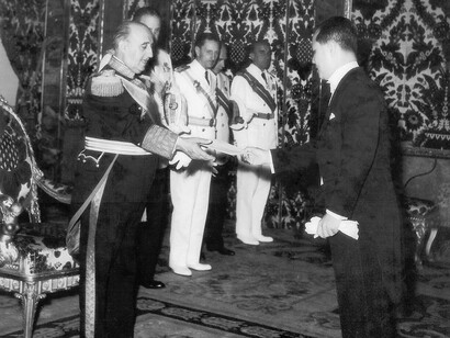 Francisco Franco greeting a foreign envoy
