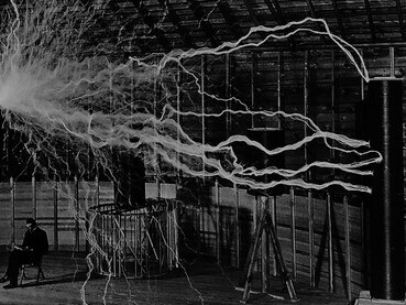 Famous photograph of Serbian-American inventor Nikola Tesla in his laboratory in Colorado Springs around 1899