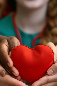 Hands forming a heart shape, symbolizing kindness and compassion