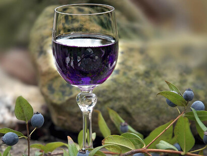 A glass of Mirto
