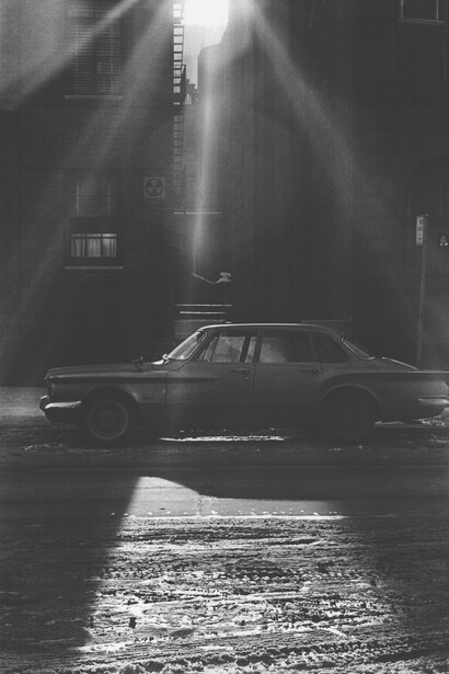 Ann Treer, Untitled (Car on Snowy Street), c. 1960's, vintage silver print mounted to board, 13.5x9.125 inches, © The Estate of Ann Treer. Courtesy Robert Mann Gallery