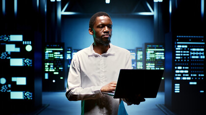 An IT professional carefully updates server systems to ensure the infrastructure supporting e-commerce remains agile and responsive to the ever-changing digital marketplace