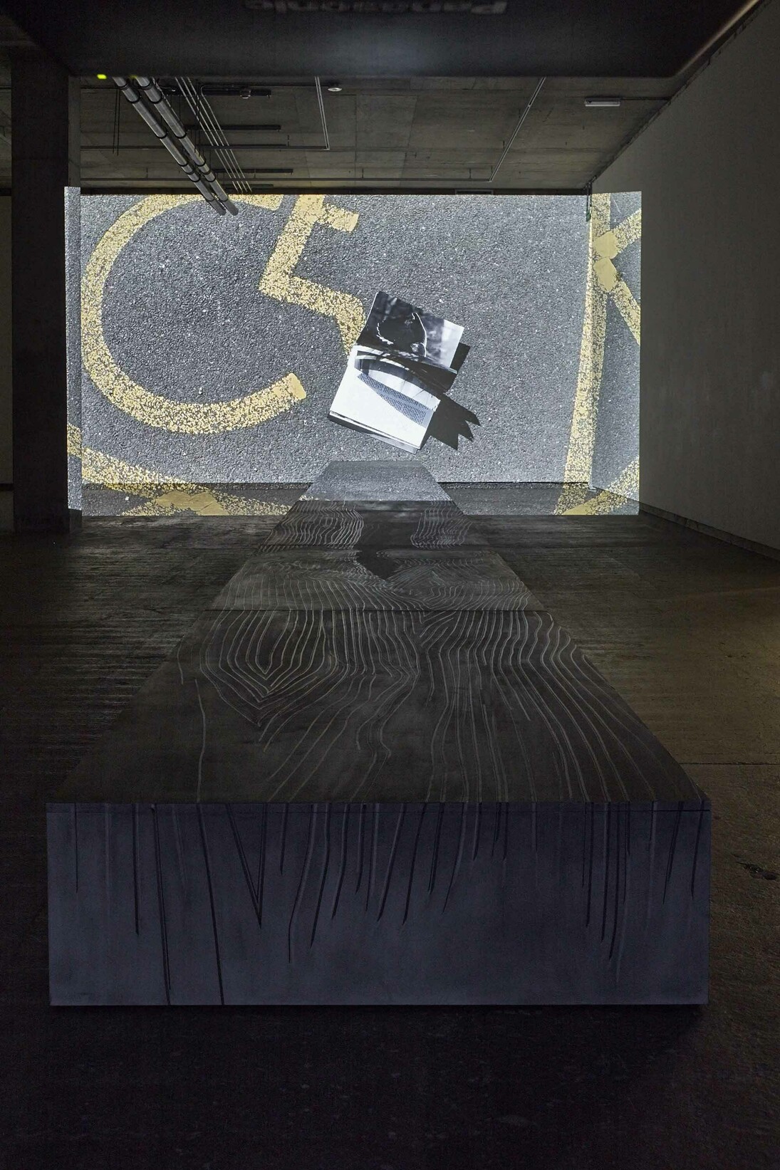 Fiona Banner, Phantom (SS16) 2015, Graphite, vinyl, birch plywood with high definition digital film, 39 x 1540 x 122 cm (runway), 9.28 minutes (film), Courtesy the artist and Frith Street Gallery, London 