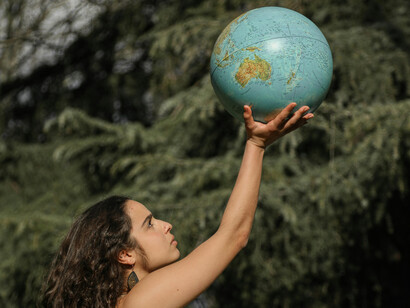 A woman hold the world in her hands