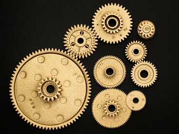 Engrenagens metálicas simbolizam a interação entre diferentes componentes de um sistema tecnológico. A inovação científica depende da articulação entre pesquisa, desenvolvimento, proteção intelectual e aplicação prática do conhecimento