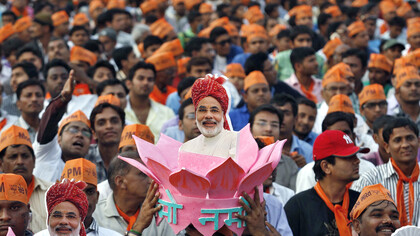 Supporters of Narendra Modi, the Prime ministerial candidate for Bharatiya Janata Party