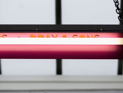 Natalie Dray, Infrared Fuchsia, 2015, Lamp holder, Ruby Jacketed Lamp,Ceramic Connector,1.5mm 3 core butyl flex, M20 Cable Gland, Rugged Plug Top, Powder coated Steel, Stainless steel + universal burning position, 1500W. Image courtesy the artist and Cell Project Space, London. Photo: Mariell Amélie