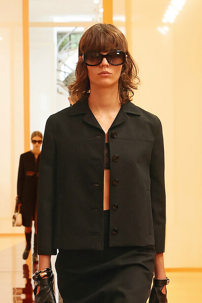 Each black outfit is a testament to the craftsmanship of Gucci, as silhouettes blend boldness and sophistication in a striking visual display