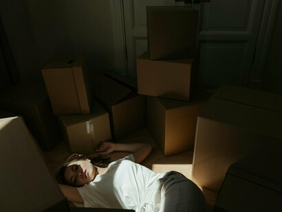 A moment to rest before resuming the chores to move to a new place