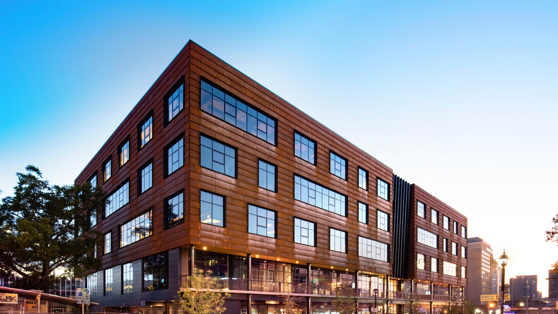 The striking metal panels on this modern building not only enhance its aesthetic appeal but also offer durability and sustainability, making it a top choice for innovative architecture